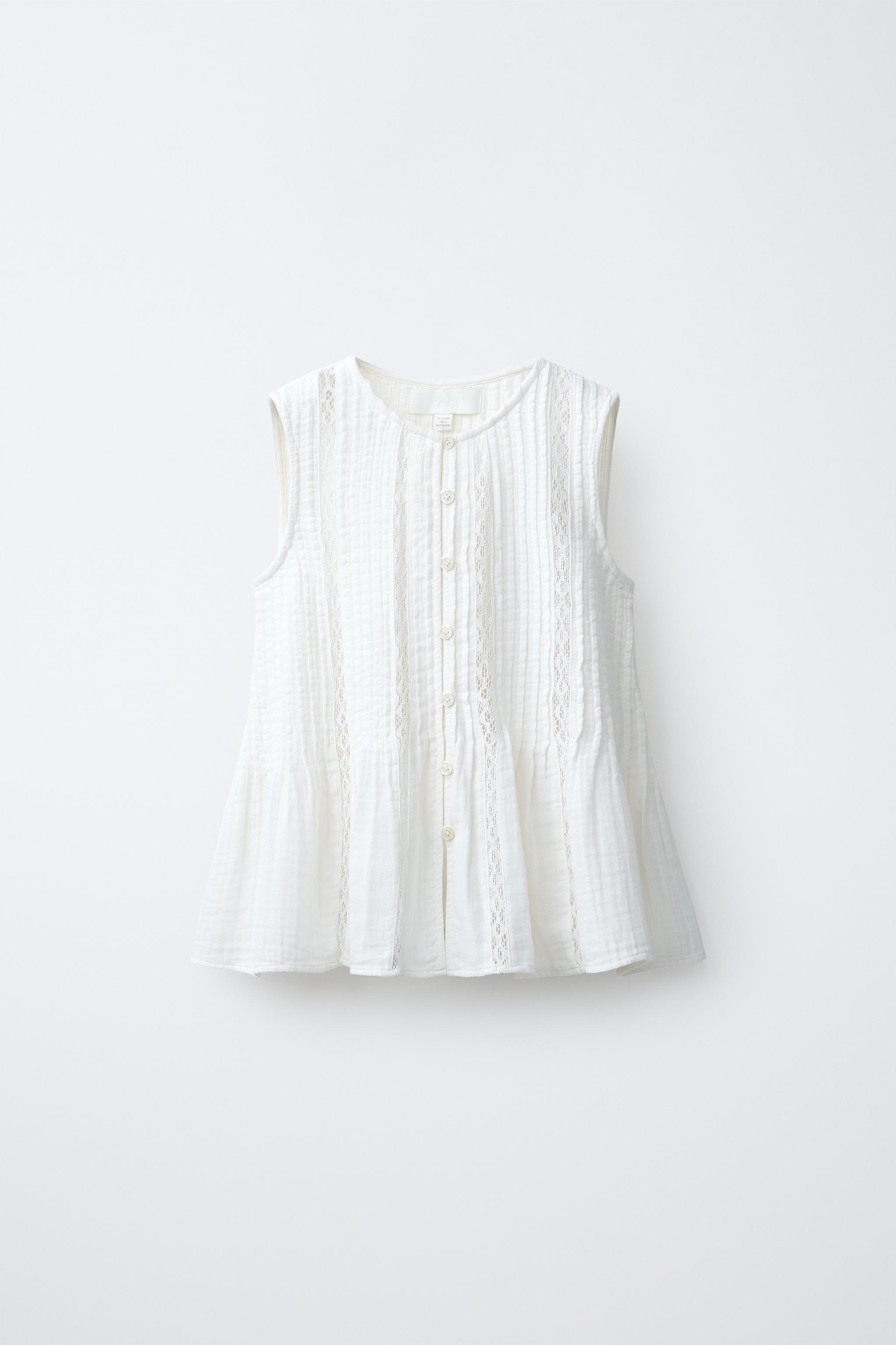 BLOUSE ENTRE-DEUX PLIS NERVURÉS